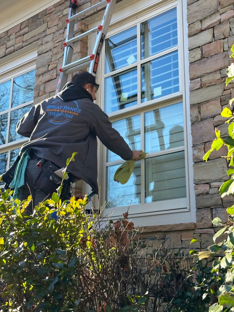 Great Panes professional cleaning an exterior residential window